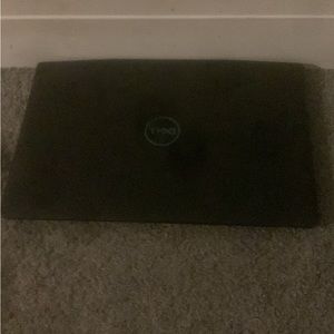 One black used dell laptop